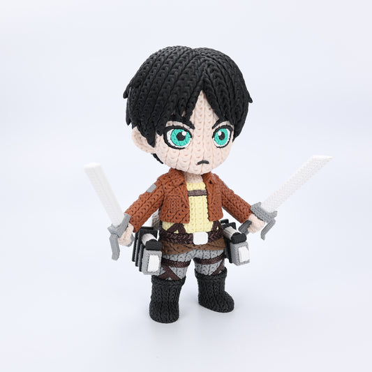 Crocheted textured character with black hair and green eyes, holding two swords on a white background.